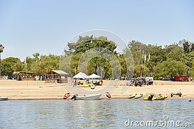 Beach on the Uruguay River in Colon in Entre Rios, Argentina. Kayak rental point Editorial Stock Photo