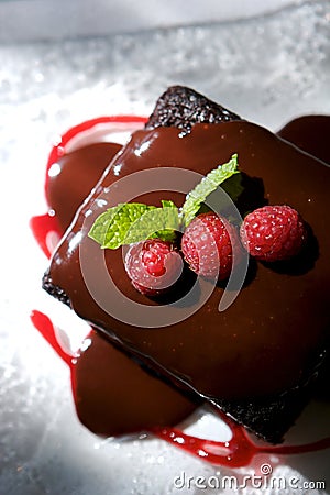 Decadent chocolate cake with raspberries Stock Photo