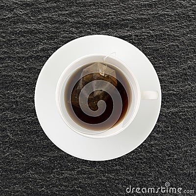 Decaffeinated black tea with tea bag in a cup Stock Photo
