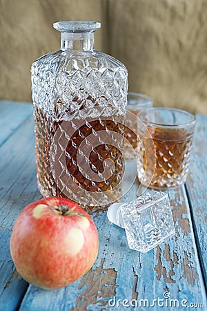 Decanter, glasses and apple Stock Photo