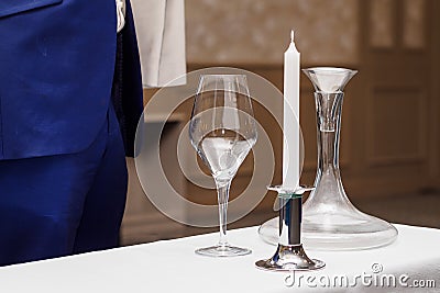 Decanter, wine glass, candle for wine tasting Stock Photo