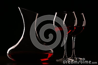 Decanter with wine and glasses Stock Photo