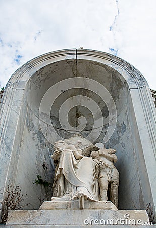 Decapitated Statue in Cemetery Stock Photo