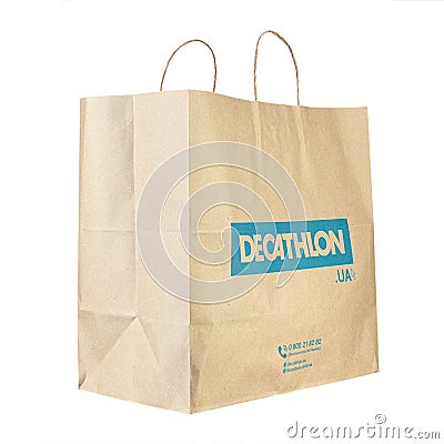 Decathlon brand paper bag. Decathlon is a french company and one of the world`s largest sporting goods retailers. File contains Editorial Stock Photo