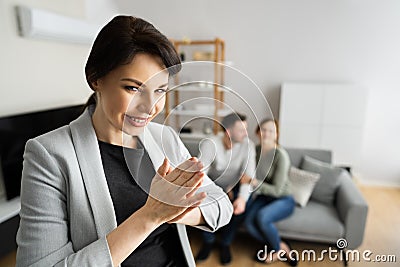 Deceitful Lying Salesman Lying To Couple Stock Photo