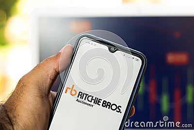 December 18, 2020, Brazil. In this photo illustration the Ritchie Bros. Auctioneers RBA logo seen displayed on a smartphone Cartoon Illustration