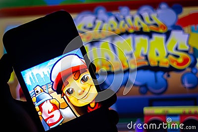 December 30, 2020, Brazil. In this photo illustration the Subway Surfers logo game seen displayed on a smartphone Cartoon Illustration