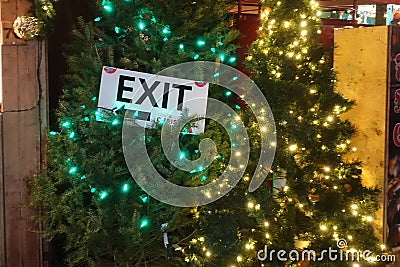 December 2018- Exit sign on the Christmas tree at Christmas market in Vancouver, BC Canada Editorial Stock Photo