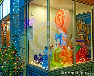 Large inflatable candy cane in Christmas store display Editorial Stock Photo