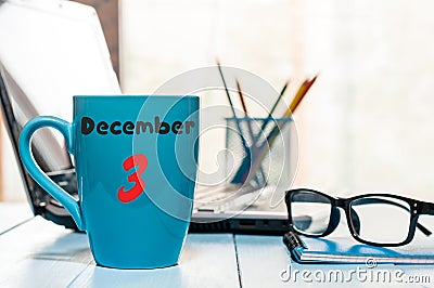 December 3rd. Day 3 of month, Calendar on cup morning coffee or tea, insurance agent workplace background. Winter time Stock Photo