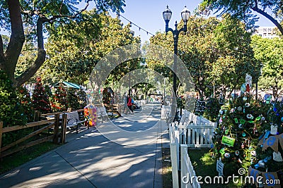 December 6, 2017 San Jose / CA / USA - Alley in Christmas in the park downtown display in Plaza de Cesar Chavez, Silicon Valle Editorial Stock Photo