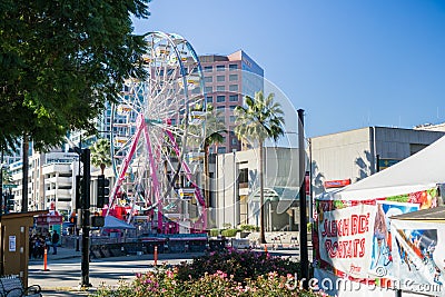 December 6, 2017 San Jose / CA / USA - Ferris wheel at Christmas in the park downtown display in Plaza de Cesar Chavez, Silico Editorial Stock Photo