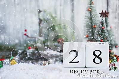 December 28th Calendar Blocks with Christmas Decorations Stock Photo