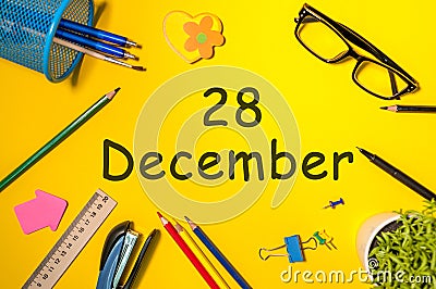 December 28th. Day 28 of december month. Calendar on yellow businessman workplace background. Winter time Stock Photo