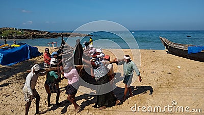 December 2021, Thiruvananthapuram, Unidentified location fishermen, Kovalam beach, Thiruvananthapuram, Kerala, seascape view Editorial Stock Photo