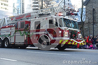 December 2018- Vancouver Fire & Rescue Firetruck in Christmas Parade in Vancouver, BC Canada Editorial Stock Photo