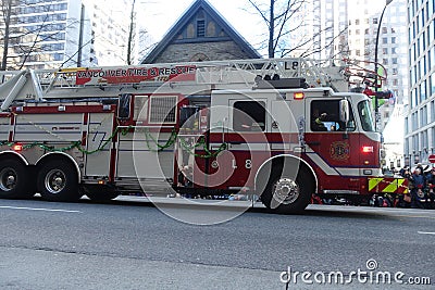 December 2018- Vancouver Fire & Rescue Firetruck in Santa Clause Parade in Vancouver, BC Canada Editorial Stock Photo