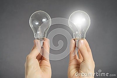 Decision making concept, hands with light bulbs Stock Photo