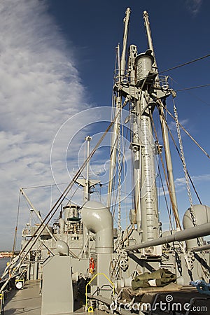 Deck with boom and mast on Liberty Ship Stock Photo