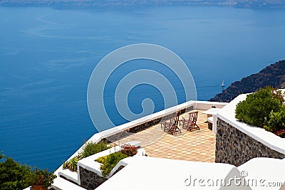 Deck chairs in Thira, Santorini, Greece Stock Photo