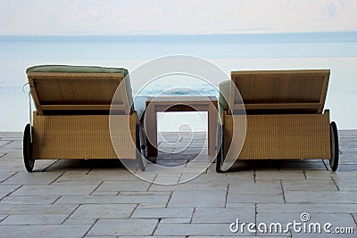 Deck Chairs by Water Stock Photo