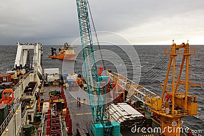 Deck of the pipelaying barge. Stock Photo