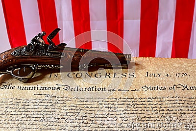 Flintlock pistol on Declaration of Independence Editorial Stock Photo