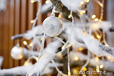 Decorate Christmas tree with toys Stock Photo