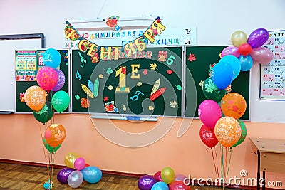 Decorated blackboard in classroom on holiday of beginning of elementary school education. School and education concept Editorial Stock Photo