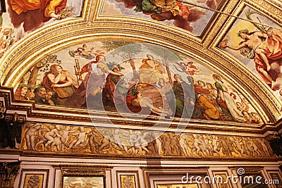 Decorated ceiling with frescos in the museum Palazzo Te in Mantova, Italy Editorial Stock Photo