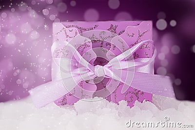 Decorated Christmas purple gift box in show Stock Photo