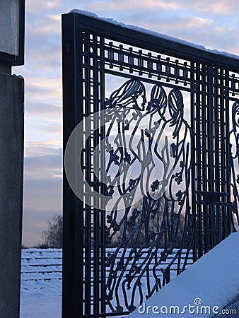 Decorated gate with three women Editorial Stock Photo