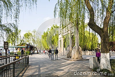 decorated gateway and green willow Editorial Stock Photo