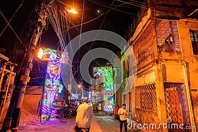 Decorated and illuminated street during Durga puja festival night Editorial Stock Photo