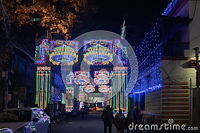 Decorated and illuminated street during Durga puja festival night Editorial Stock Photo
