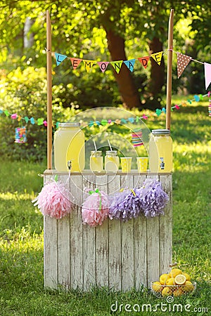 Decorated lemonade stand. Summer refreshing natural drink Stock Photo