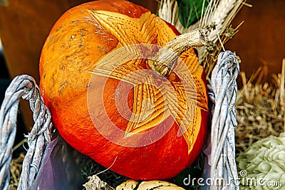 decorated pumpkin. carvings in a decorative pumpkin. Harvest festival. Craftsmanship Stock Photo