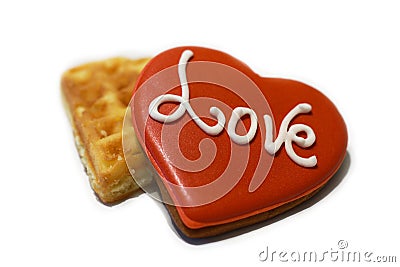 Decorated red heart shaped cookies with word LOVE on white background, top view Stock Photo