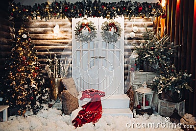 Decorated studio for Christmas holiday with doors in center. Stock Photo