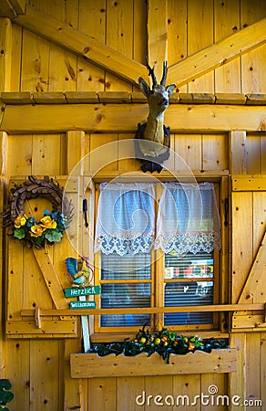 Decorated wood façade at Pass Pordoi Dolomites Sella group, Italy Stock Photo