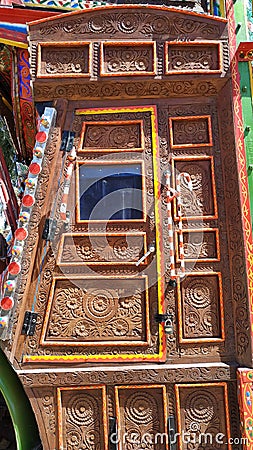 Decorated wooden door of a truck Stock Photo