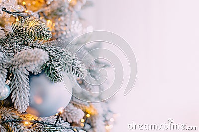 Decorated xmas tree on white wall background Stock Photo