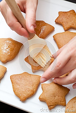 Decorating gingerbread Stock Photo