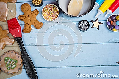 Decorating of gingerbread man Christmas cookie Stock Photo