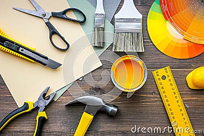 Decorating and house renovation tools and accessories on wooden table background top view Stock Photo