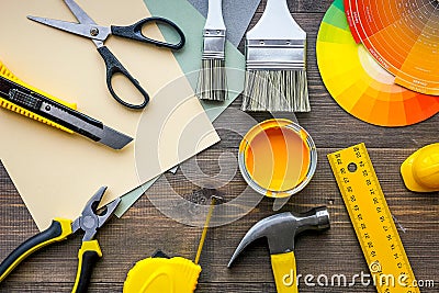 Decorating and house renovation tools and accessories on wooden table background top view Stock Photo