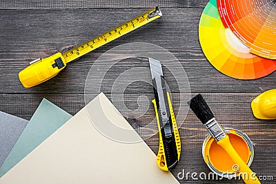 Decorating and house renovation tools and accessories on wooden table background top view mockup Stock Photo