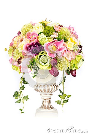 Decoration artificial plastic flower with vintage design vase Stock Photo