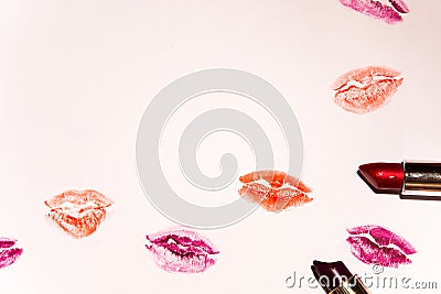 Multicolored lipstick marks kiss mouths on white background Stock Photo