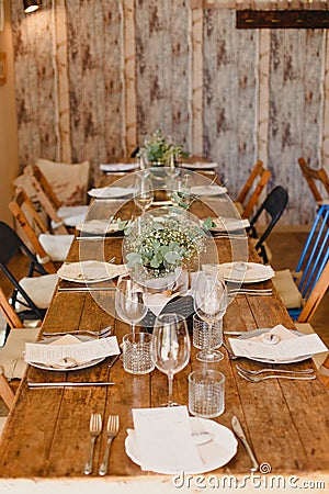 Decoration of the centerpieces of a wedding with the cutlery and vintage details Editorial Stock Photo